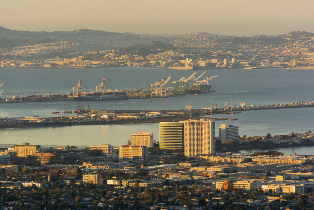 Wide angle view of the city of Emeryville California focusing on a high rise building